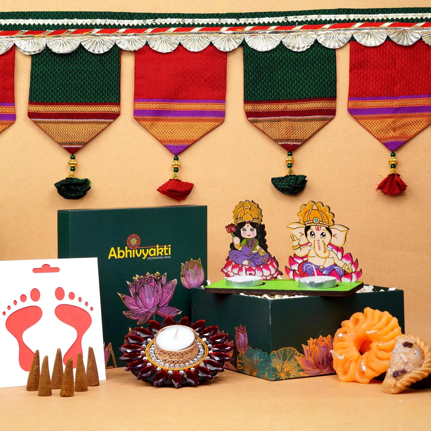 A festive Diwali hamper filled with an assortment of decorative items and treats. The hamper includes colorful floating diya, a box of mithai sweet candle, fragrant incense sticks, a small decorative toran, and festive Ganesh Lakshmi tealight. The items are beautifully arranged in a festive box with vibrant, rich colors and intricate detailing, evoking the spirit of Diwali celebrations. The hamper is a perfect gift for the festive vibe