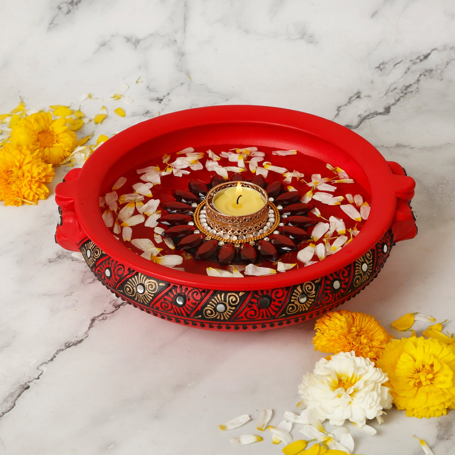 A collection of colorful floating tealight diyas, intricately designed with floral patterns and bright hues. The diyas are crafted from traditional Indian materials, adding a festive and cultural touch to any setting. Perfect for illuminating water bowls or enhancing Diwali decor with a soft, warm glow