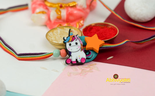 A colorful unicorn charm on a colorful ribbon, kids Rakhi with beautiful beads.