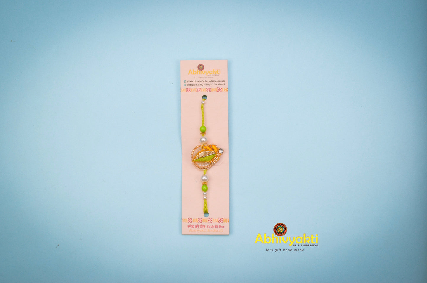 Green thread, zardozi thread and crystal rakhi 