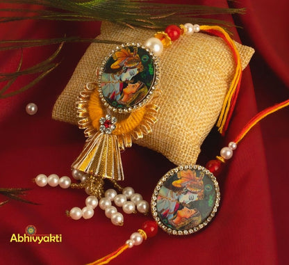 A beautiful rakhi with stone and a pearl necklace, perfect for a special occasion.