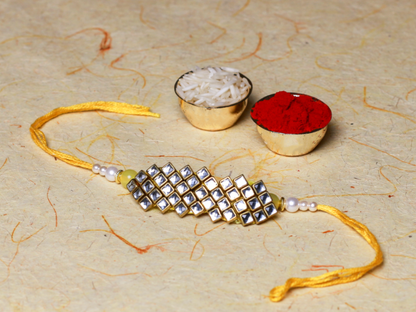 Rakhi to Indian Soldiers - ELEGANT KUNDAN RAKHI WITH DEEP YELLOW THREAD